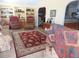 Spacious living room with a comfortable seating arrangement and built-in shelving at 197 Philadelphia Blvd # 26, Palm Harbor, FL 34684