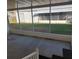 Spacious screened porch overlooking the backyard at 197 Philadelphia Blvd # 26, Palm Harbor, FL 34684