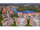 Stunning aerial view of a lakeside condo complex featuring well-manicured landscaping and water views at 43 Bayview S Ct # A, St Petersburg, FL 33711