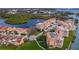 Gorgeous aerial view of a waterfront neighborhood showcasing lake, water, and houses at 43 Bayview S Ct # A, St Petersburg, FL 33711