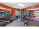 Bright gym featuring cardio equipment, weights, and mirrored walls at 43 Bayview S Ct # A, St Petersburg, FL 33711