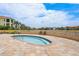 Relaxing community hot tub area with views of the lake and lush landscaping at 43 Bayview S Ct # A, St Petersburg, FL 33711