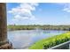 Scenic view of lake and fountain from a covered balcony at 43 Bayview S Ct # A, St Petersburg, FL 33711