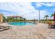 Stunning community pool with lounge chairs, water views, and manicured landscaping at 43 Bayview S Ct # A, St Petersburg, FL 33711