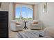 Seating area with waterfront views, neutral colors, and wood-look floors at 43 Bayview S Ct # A, St Petersburg, FL 33711