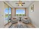 Seating area with lake views, neutral colors, and wood-look floors at 43 Bayview S Ct # A, St Petersburg, FL 33711