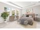 Spacious main bedroom with neutral decor and large windows at 23176 Pachino Way, Lutz, FL 33549