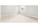 Simple bedroom with neutral walls and carpet flooring at 23176 Pachino Way, Lutz, FL 33549