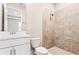 Clean bathroom with a large shower and white vanity at 23176 Pachino Way, Lutz, FL 33549