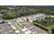 Aerial view highlighting home location near a pond at 23176 Pachino Way, Lutz, FL 33549