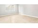 Bright bedroom featuring neutral walls and tile flooring at 23176 Pachino Way, Lutz, FL 33549