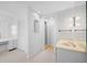 Bathroom with double vanity and shower at 1 Beach Se Dr # 1208, St Petersburg, FL 33701