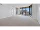 Bright living room with large windows offering city views at 1 Beach Se Dr # 1208, St Petersburg, FL 33701