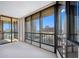 Expansive living room with wall-to-wall windows and city views at 1 Beach Se Dr # 1208, St Petersburg, FL 33701