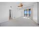 Spacious bedroom with city views and ceiling fan at 1 Beach Se Dr # 1208, St Petersburg, FL 33701