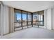 Living room showcasing panoramic city views from large windows at 1 Beach Se Dr # 1208, St Petersburg, FL 33701