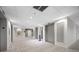 Elegant hallway with elevators and artwork at 1 Beach Se Dr # 1208, St Petersburg, FL 33701