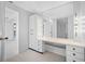 Spacious bathroom with large mirror and vanity at 1 Beach Se Dr # 1208, St Petersburg, FL 33701