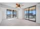 Bedroom with city views and ceiling fan at 1 Beach Se Dr # 1208, St Petersburg, FL 33701