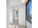 Spacious hallway with access to a bedroom and balcony at 1 Beach Se Dr # 1208, St Petersburg, FL 33701