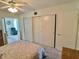 Bedroom featuring a closet and view into the living room at 2385 Tahitian Ln # 63, Clearwater, FL 33763