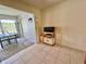 Open dining area featuring tile flooring and a microwave stand at 2385 Tahitian Ln # 63, Clearwater, FL 33763