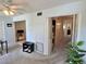 View of a room featuring a laundry area and access to another room at 2385 Tahitian Ln # 63, Clearwater, FL 33763