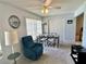 Bright living room area with ceiling fan and comfortable seating at 2385 Tahitian Ln # 63, Clearwater, FL 33763