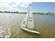Vintage model sailboat on calm water at 2451 E Del Webb Blvd, Sun City Center, FL 33573