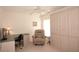 Bedroom with built-in murphy bed and workspace at 2451 E Del Webb Blvd, Sun City Center, FL 33573