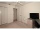 Bedroom with a desk and closet at 2451 E Del Webb Blvd, Sun City Center, FL 33573