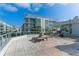 Spacious rooftop terrace with lounge chairs and city views at 912 Channelside Dr # 2607, Tampa, FL 33602