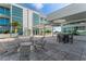 Shared rooftop patio with seating areas and city views at 912 Channelside Dr # 2607, Tampa, FL 33602