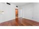 Light-filled bedroom with hardwood floors and access to bathroom at 912 Channelside Dr # 2607, Tampa, FL 33602