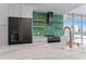 Modern kitchen with marble countertops and stainless steel appliances at 912 Channelside Dr # 2607, Tampa, FL 33602