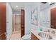 Modern bathroom with walk-in shower and updated vanity at 912 Channelside Dr # 2607, Tampa, FL 33602