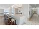 Modern community kitchen with bar seating and appliances at 912 Channelside Dr # 2607, Tampa, FL 33602