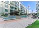 Resort-style pool and spa with lounge chairs at 912 Channelside Dr # 2607, Tampa, FL 33602