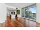 Open concept living room and kitchen with hardwood floors and city views at 912 Channelside Dr # 2607, Tampa, FL 33602