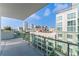 Private balcony with glass railings and city views at 912 Channelside Dr # 2607, Tampa, FL 33602