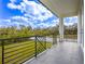 Private balcony overlooking backyard with a metal railing at 2316 S 46Th St, Tampa, FL 33619