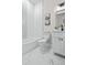 Clean bathroom with a bathtub, toilet and white vanity at 2316 S 46Th St, Tampa, FL 33619