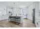 Modern kitchen with white cabinets and a large island at 2316 S 46Th St, Tampa, FL 33619