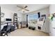 Bright home office features built-in shelving, a comfortable chair, and a large window at 2616 Garden Plum Pl, Odessa, FL 33556