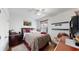 Cozy bedroom with a comfortable bed and plenty of natural light at 2616 Garden Plum Pl, Odessa, FL 33556