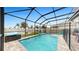 Relaxing screened pool with plenty of space for lounging at 2616 Garden Plum Pl, Odessa, FL 33556