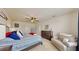 Large main bedroom with sitting area and plenty of natural light at 2616 Garden Plum Pl, Odessa, FL 33556