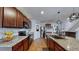 Modern kitchen with granite countertops and stainless steel appliances at 2616 Garden Plum Pl, Odessa, FL 33556
