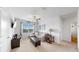 Spacious Gathering room with comfortable seating and large window at 2616 Garden Plum Pl, Odessa, FL 33556