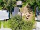 Aerial view showing a house under construction and surrounding homes at 1709 E Sitka St, Tampa, FL 33604